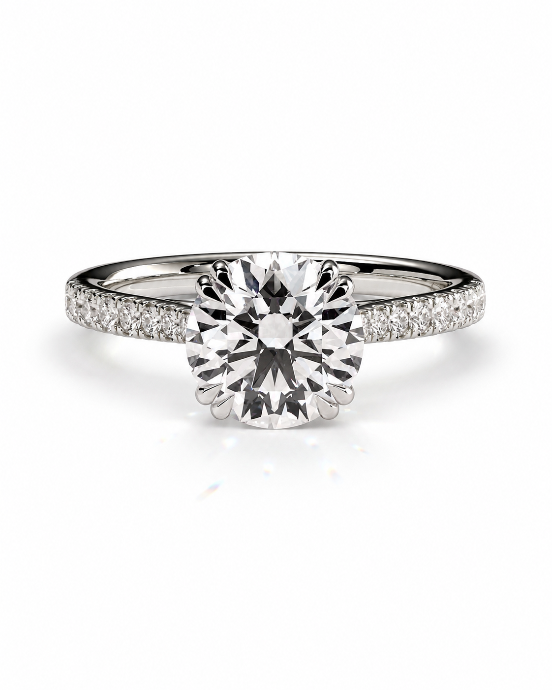color_925_SIL,color_935_ARG,color_10K_WG, color_14K_WG &&
A radiant-cut diamond engagement ring with a round center stone and a pave-set diamond band in a silver-colored metal, shown on a clean white background.
