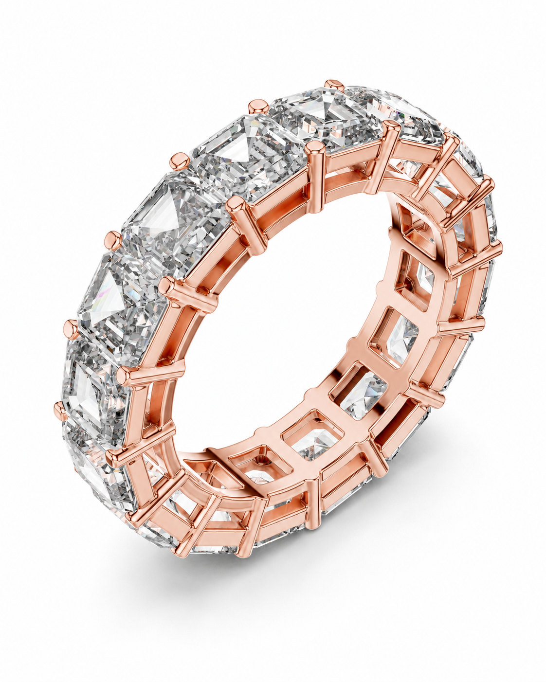 color_10K_RG, color_14K_RG &&	A rose gold eternity ring featuring a continuous channel setting of baguette-cut clear diamonds, shown on a clean white background.