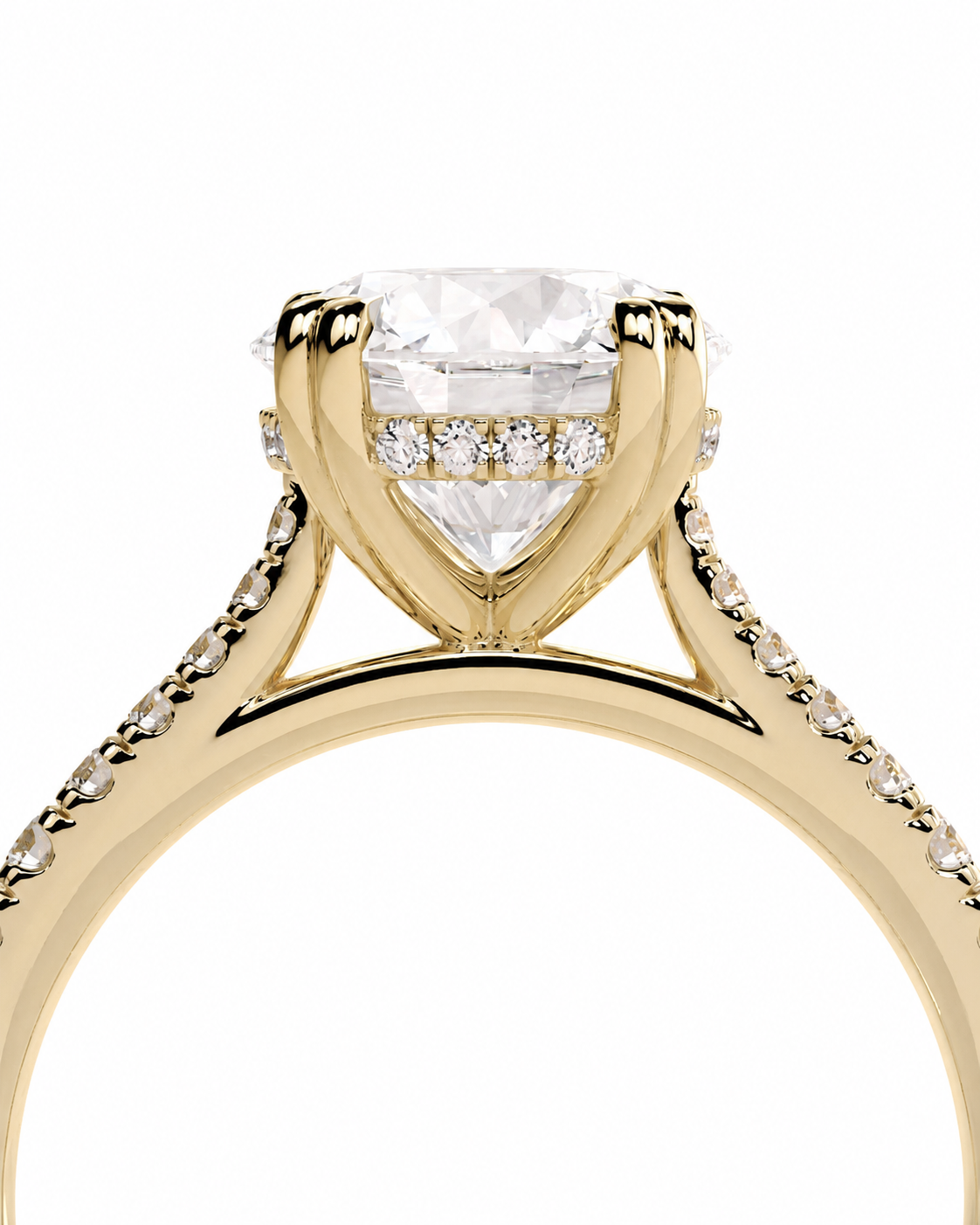 color_10K_YG, color_14K_YG &&
A close-up of a yellow gold ring featuring a large clear round-cut center stone and smaller accent stones along the band, set against a plain white background.