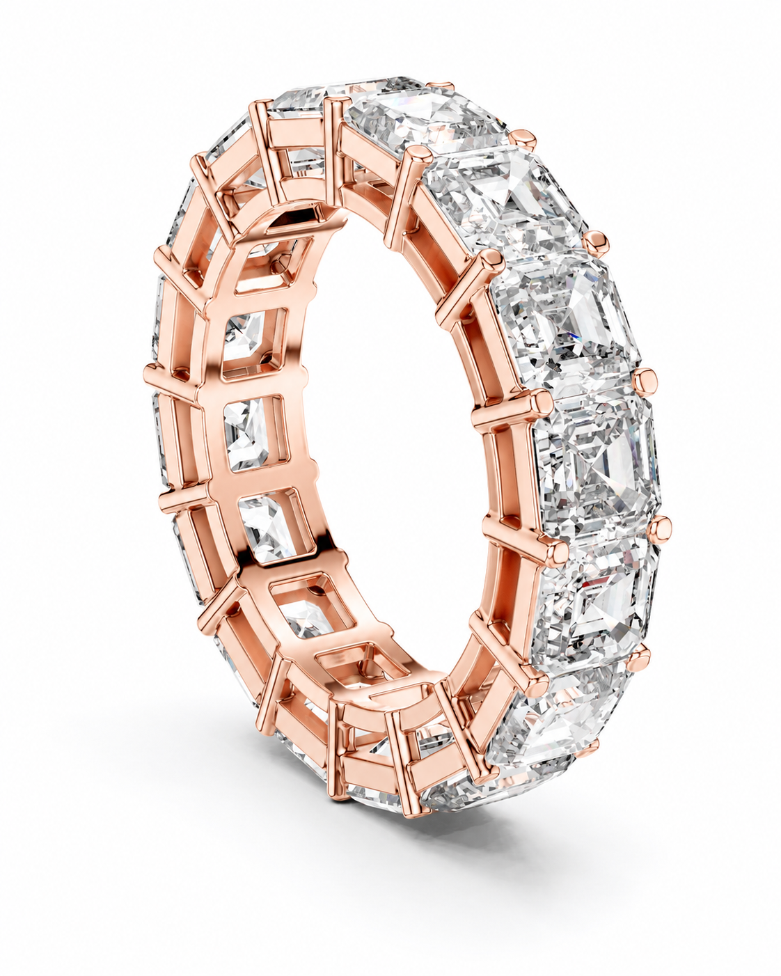 color_10K_RG, color_14K_RG &&	A rose gold eternity ring featuring a row of clear baguette-cut gemstones, shown on a clean white background.