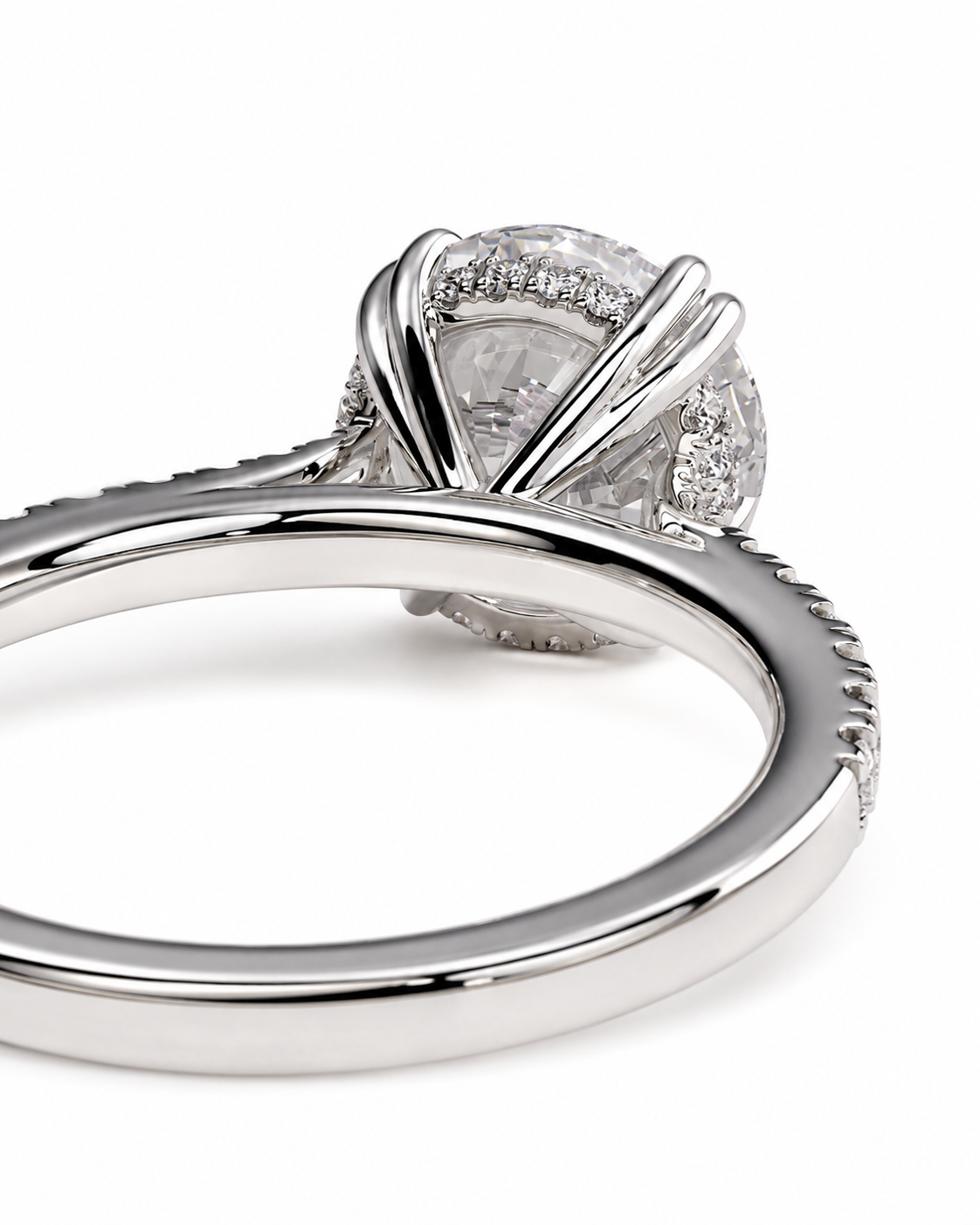 color_925_SIL,color_935_ARG,color_10K_WG, color_14K_WG &&
A close-up shot of a silver-toned diamond ring with a round-cut center stone and small accent diamonds, set in a wrap-style prong design on a white background.