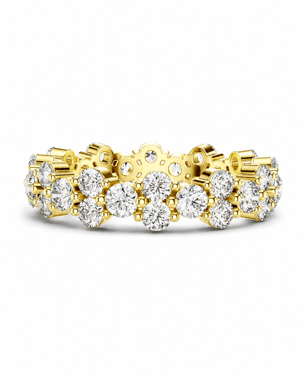color_10K_YG, color_14K_YG &&	
A yellow gold eternity ring set with multiple round brilliant-cut diamonds, photographed on a clean white background.