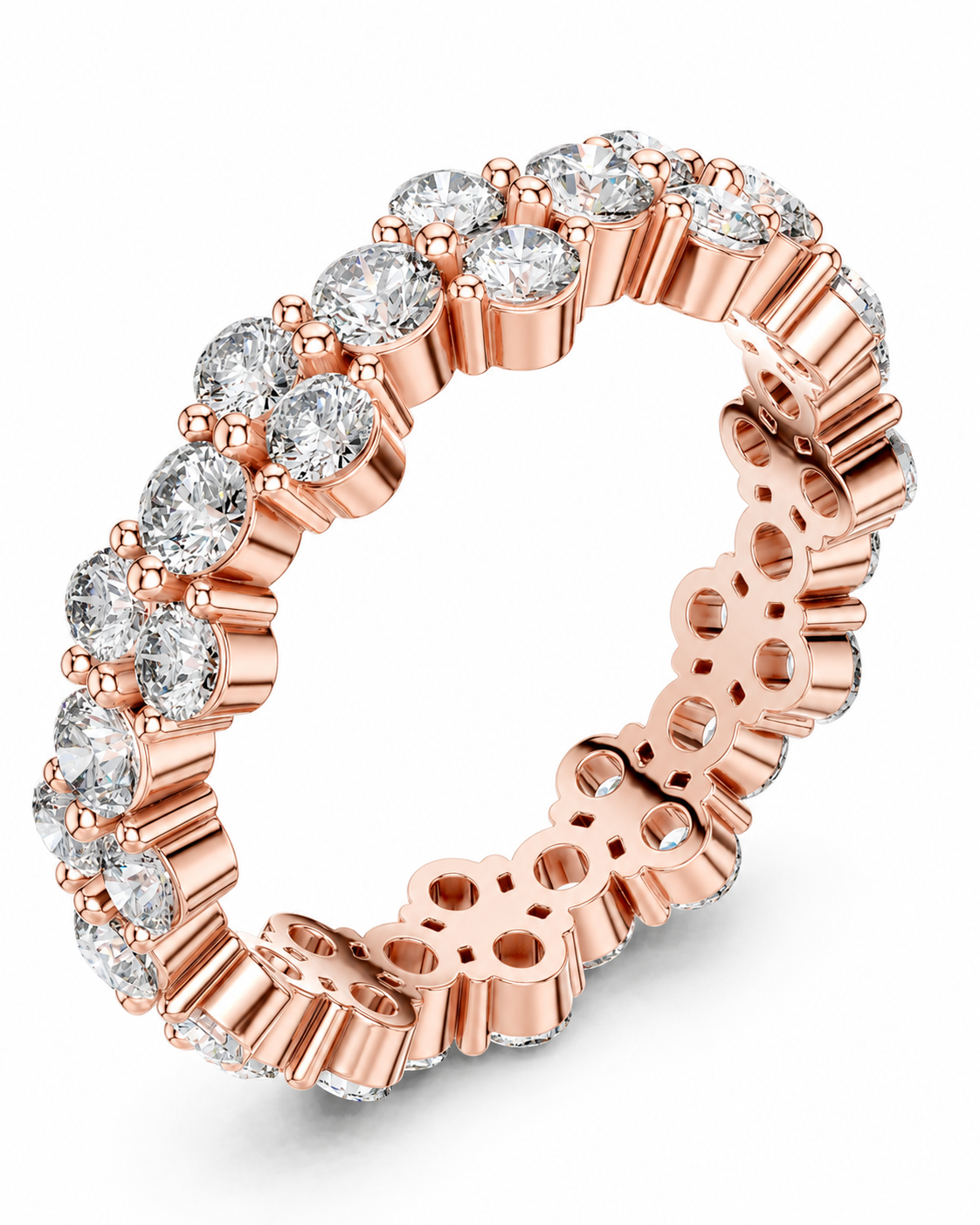 color_10K_RG, color_14K_RG &&	A rose gold eternity ring featuring a continuous row of round brilliant-cut clear gemstones in a prong setting, shown on a clean white background.