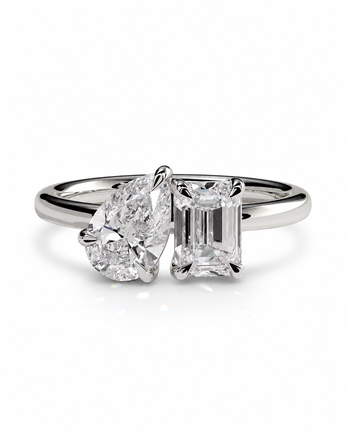 color_925_SIL,color_935_ARG,color_10K_WG, color_14K_WG &&
A silver engagement ring featuring a heart-shaped diamond and an emerald-cut diamond set in a polished silver band, shown on a clean white background.