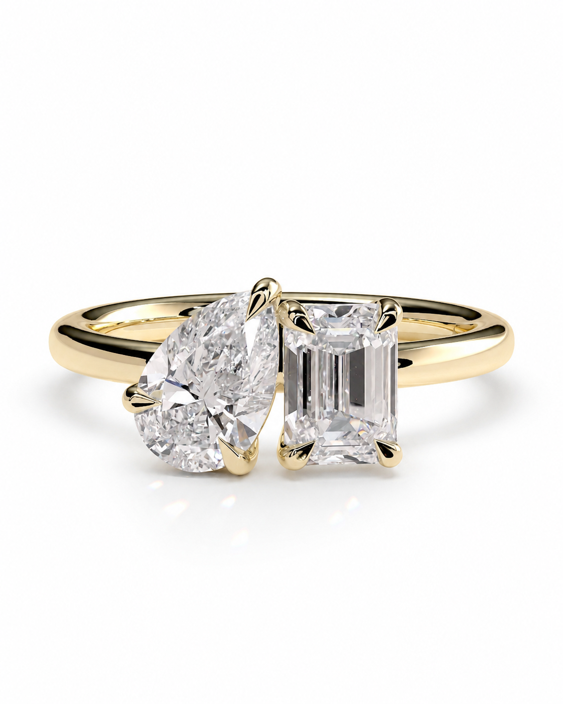 color_10K_YG, color_14K_YG &&
A yellow gold ring set featuring a heart-shaped diamond and an emerald-cut diamond, shown on a clean white background.