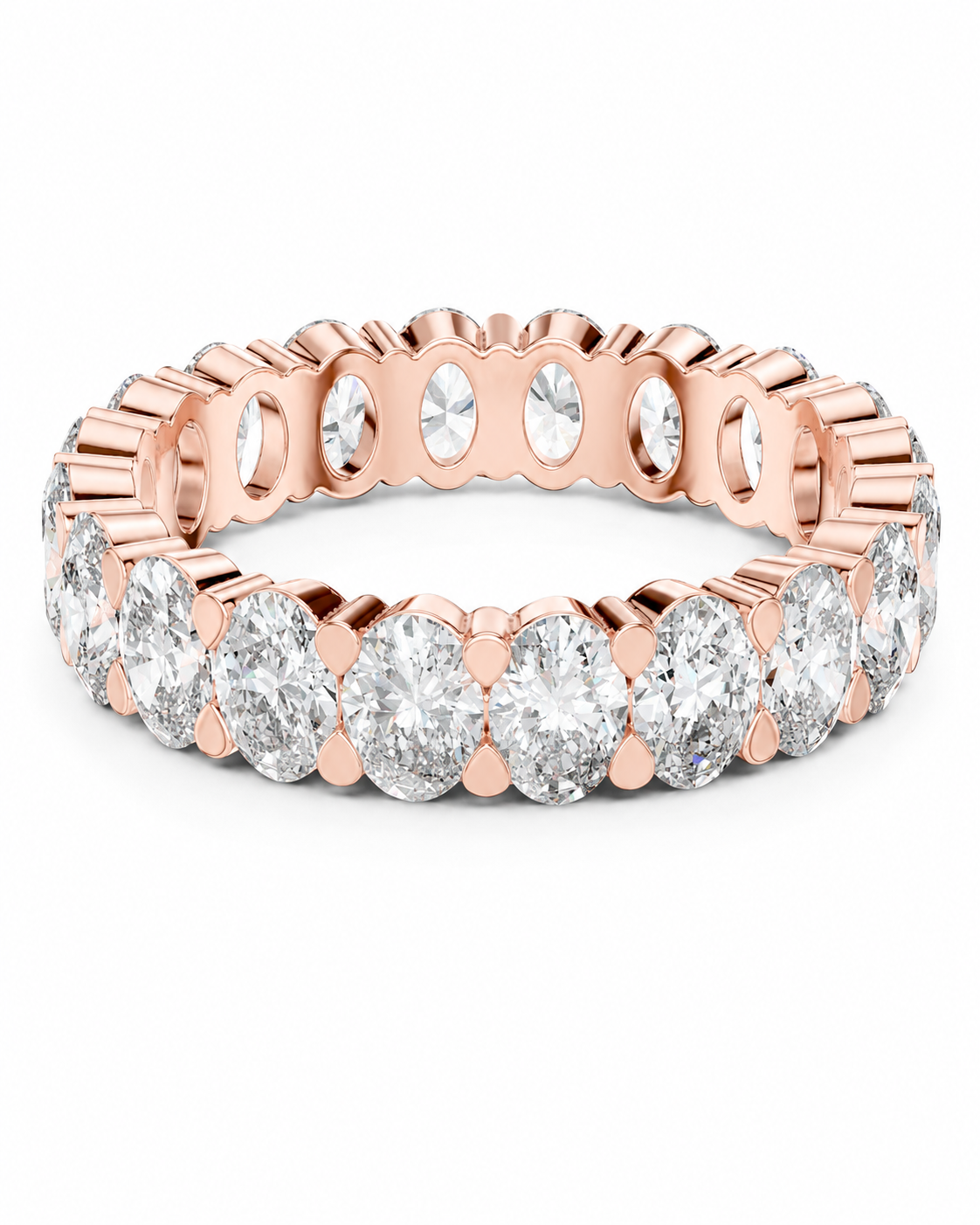 color_10K_RG, color_14K_RG &&	A rose gold eternity ring featuring a continuous row of oval-cut clear diamonds in a prong setting, shown on a clean white background.