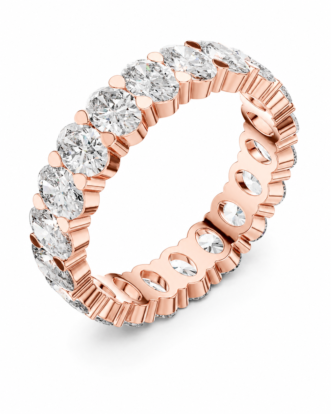 color_10K_RG, color_14K_RG &&	A rose gold eternity ring featuring a continuous row of round-cut clear gemstones in a prong setting, shown on a clean white background.