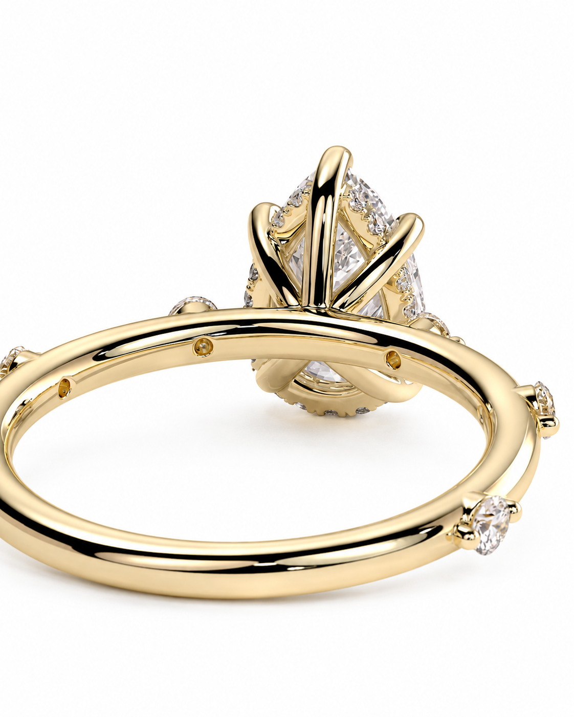 color_10K_YG, color_14K_YG &&
A yellow gold ring with a marquise-cut diamond center stone and small accent diamonds along the band, shown on a clean white background.