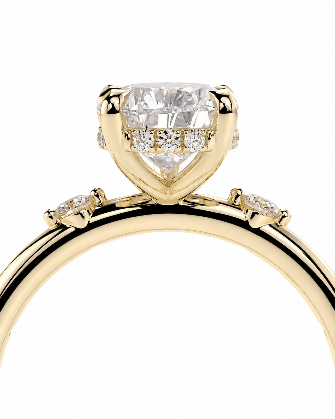 color_10K_YG, color_14K_YG &&
A close-up of a yellow gold ring featuring a large heart-shaped clear gemstone in a prong setting, accented by smaller diamonds along the band, on a solid white background.