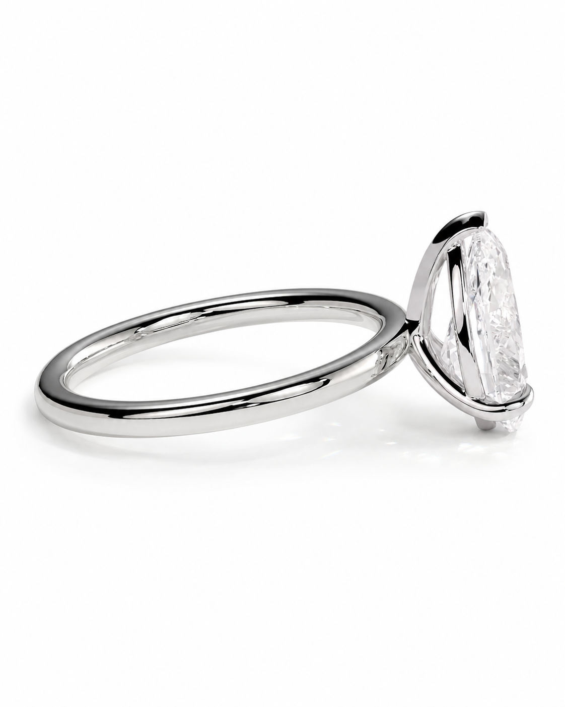 color_925_SIL,color_935_ARG,color_10K_WG, color_14K_WG &&
A silver-toned ring featuring a marquise-cut clear gemstone in a prong setting, shown on a clean white background.