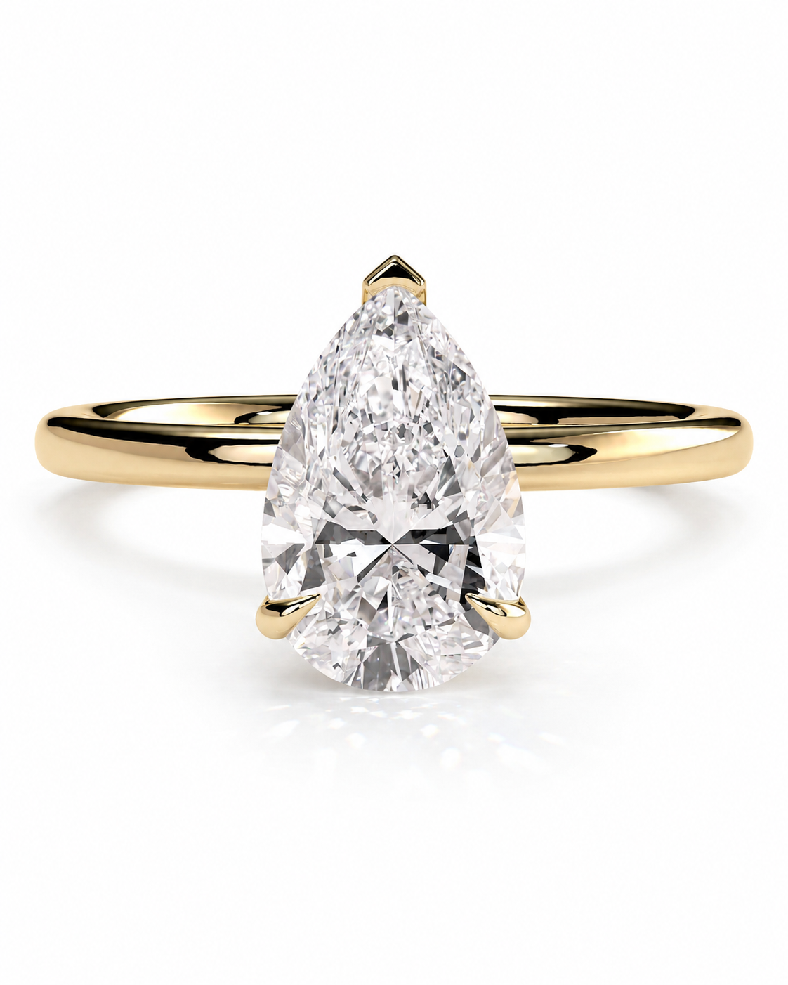 color_10K_YG, color_14K_YG &&
A pear-cut diamond engagement ring with a yellow gold band, shown on a clean white background with a soft reflection.