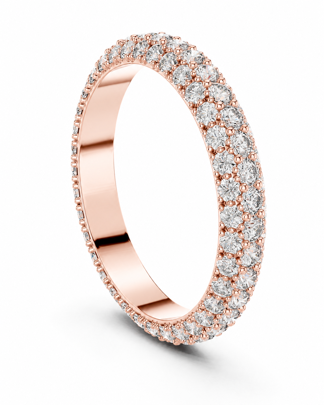 color_10K_RG, color_14K_RG &&	A rose gold eternity ring paved with round brilliant-cut diamonds, shown at an angle on a clean white background.