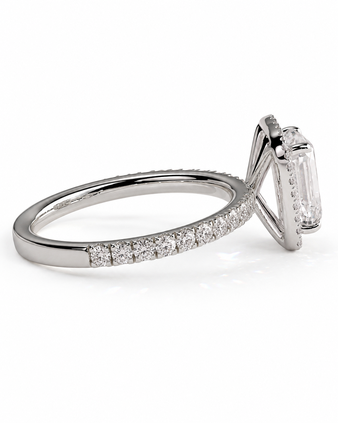 color_925_SIL,color_935_ARG,color_10K_WG, color_14K_WG &&A silver-toned diamond ring featuring a large rectangular baguette-cut center stone and a pave band with smaller round diamonds, shown on a clean white background.