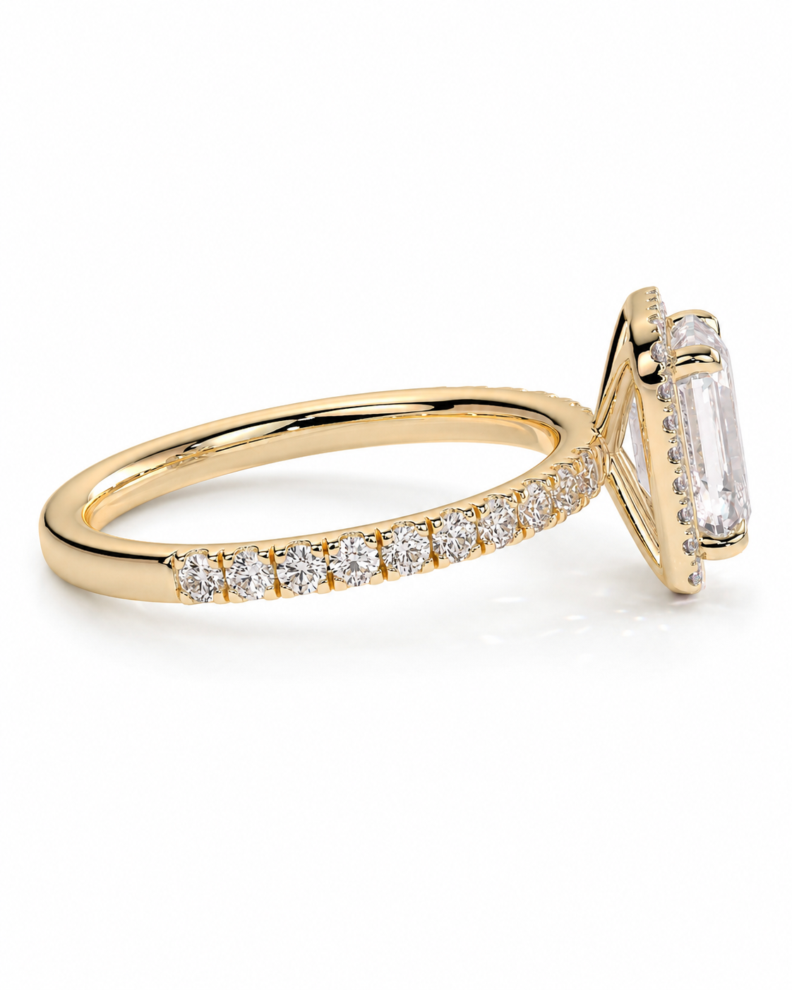 color_10K_YG, color_14K_YG &&A yellow gold ring featuring a large rectangular baguette-cut clear center stone and a shank pave-set with small round diamonds, shown on a clean white background.