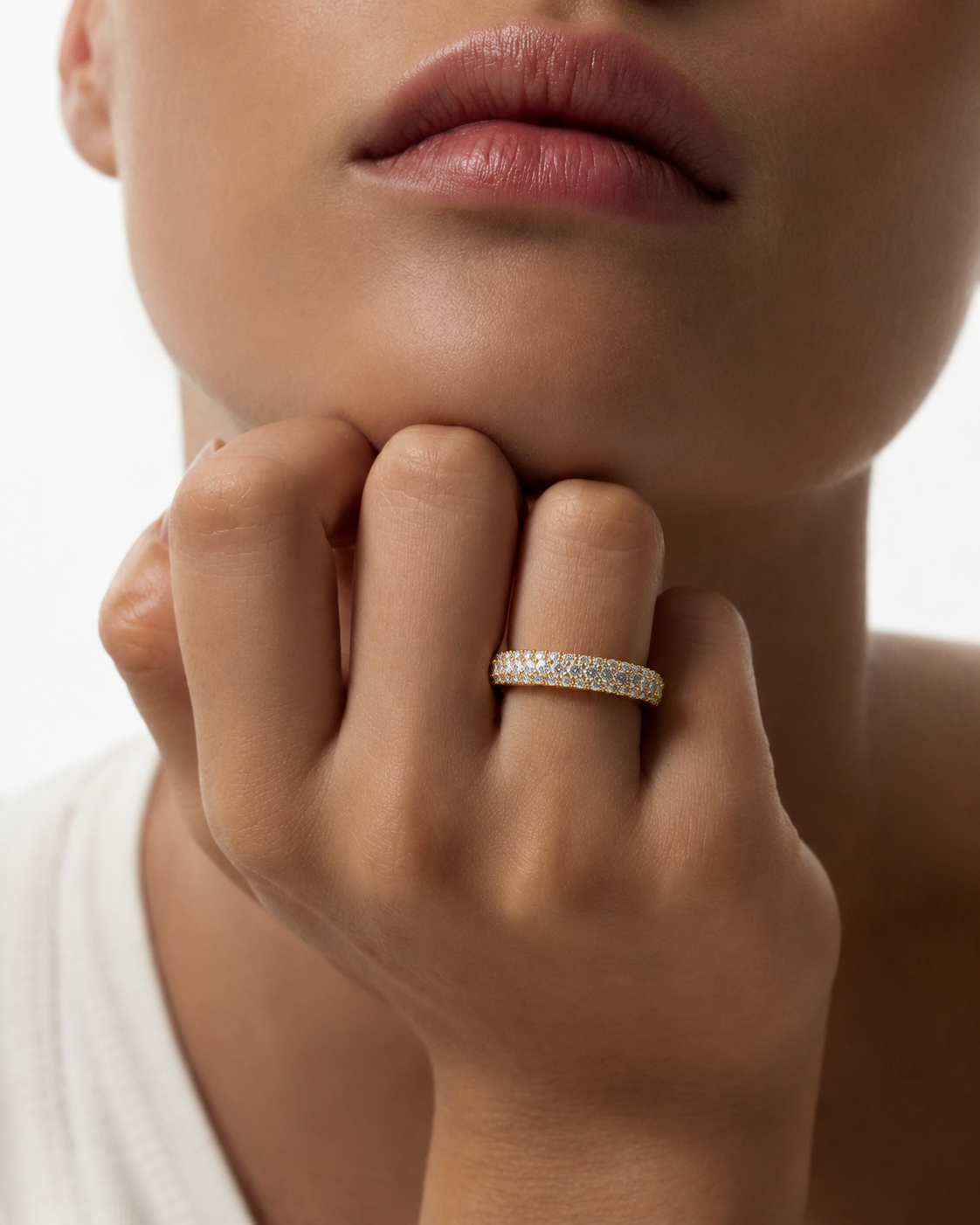 color_10K_YG, color_14K_YG &&	
Front profile of a handcrafted moissanite anniversary band with continuous dual rows of round stones.