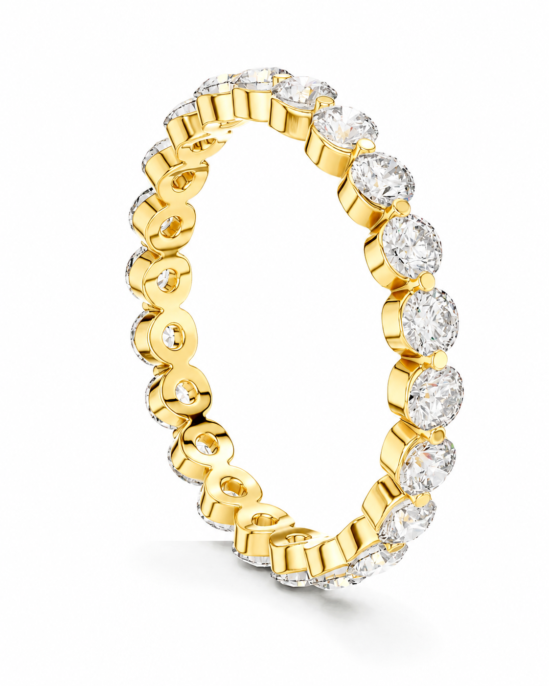 color_10K_YG, color_14K_YG &&	
A yellow gold eternity ring featuring a continuous row of round brilliant-cut clear gemstones in a prong setting, shown on a clean white background.