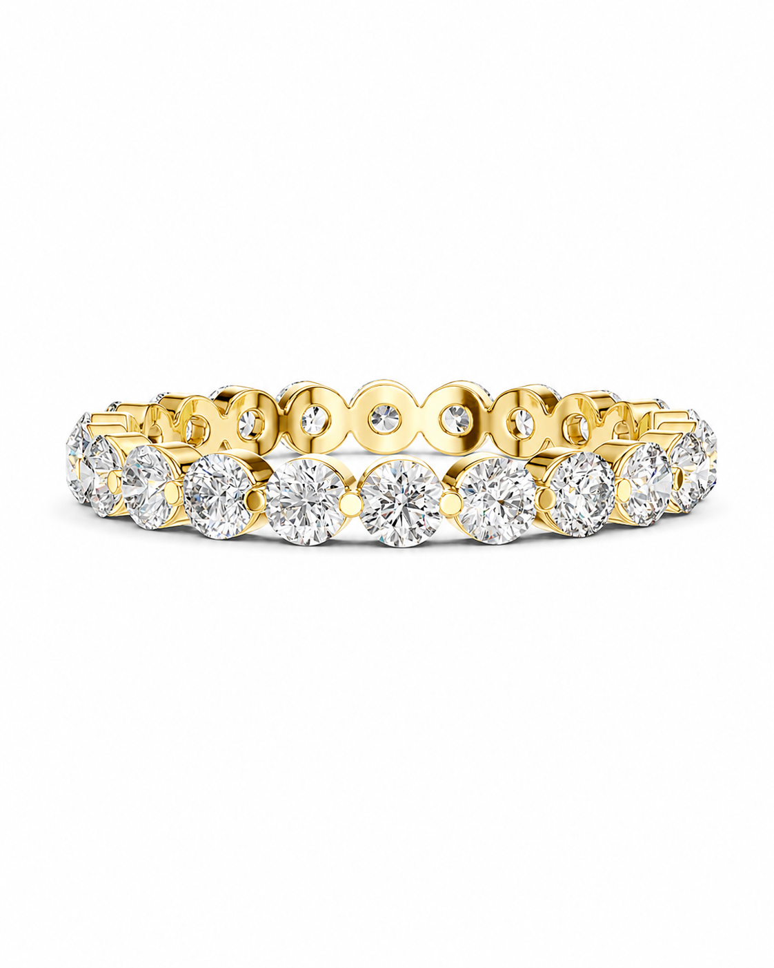 color_10K_YG, color_14K_YG &&	
A yellow gold eternity band ring featuring a continuous row of round brilliant-cut diamonds in a prong setting, shown against a plain white background.