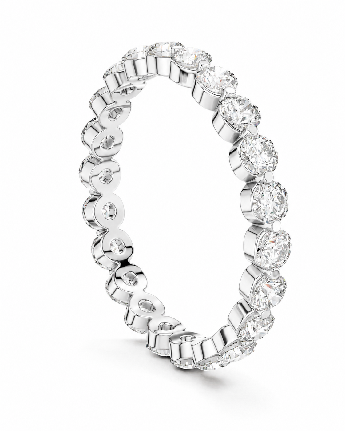 color_925_SIL,color_935_ARG,color_10K_WG, color_14K_WG &&	
A silver-toned eternity ring featuring a continuous row of round brilliant-cut diamonds in a high-profile bezel setting, shown on a clean white background.