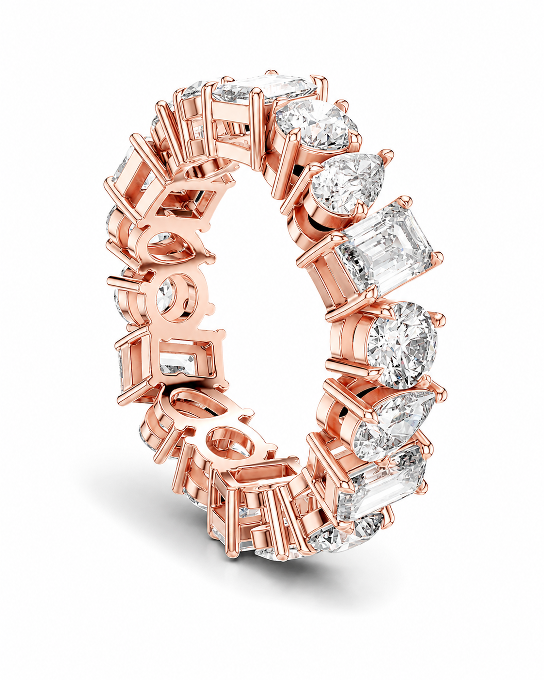 color_10K_RG, color_14K_RG &&	A rose gold eternity ring featuring multiple brilliant-cut and cushion-cut diamonds in a continuous band setting, shown on a clean white background.