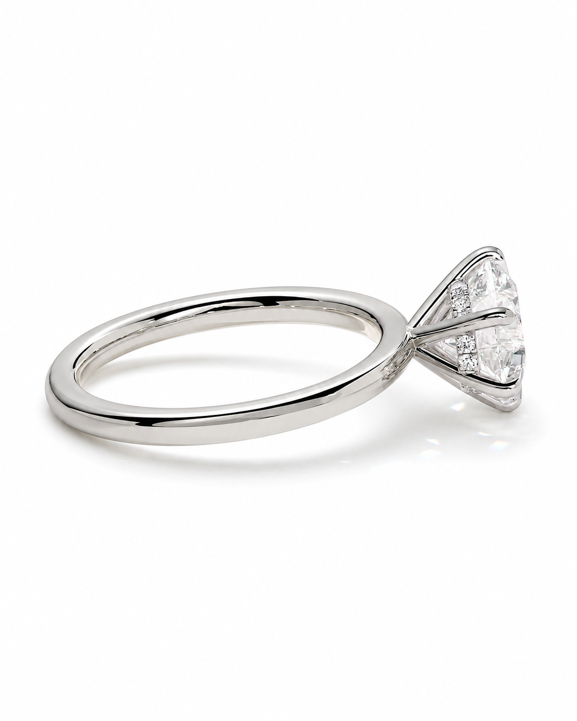 color_925_SIL,color_935_ARG,color_10K_WG, color_14K_WG &&A silver-toned diamond ring with a triangular cluster of clear stones on a polished band, shown on a clean white background.