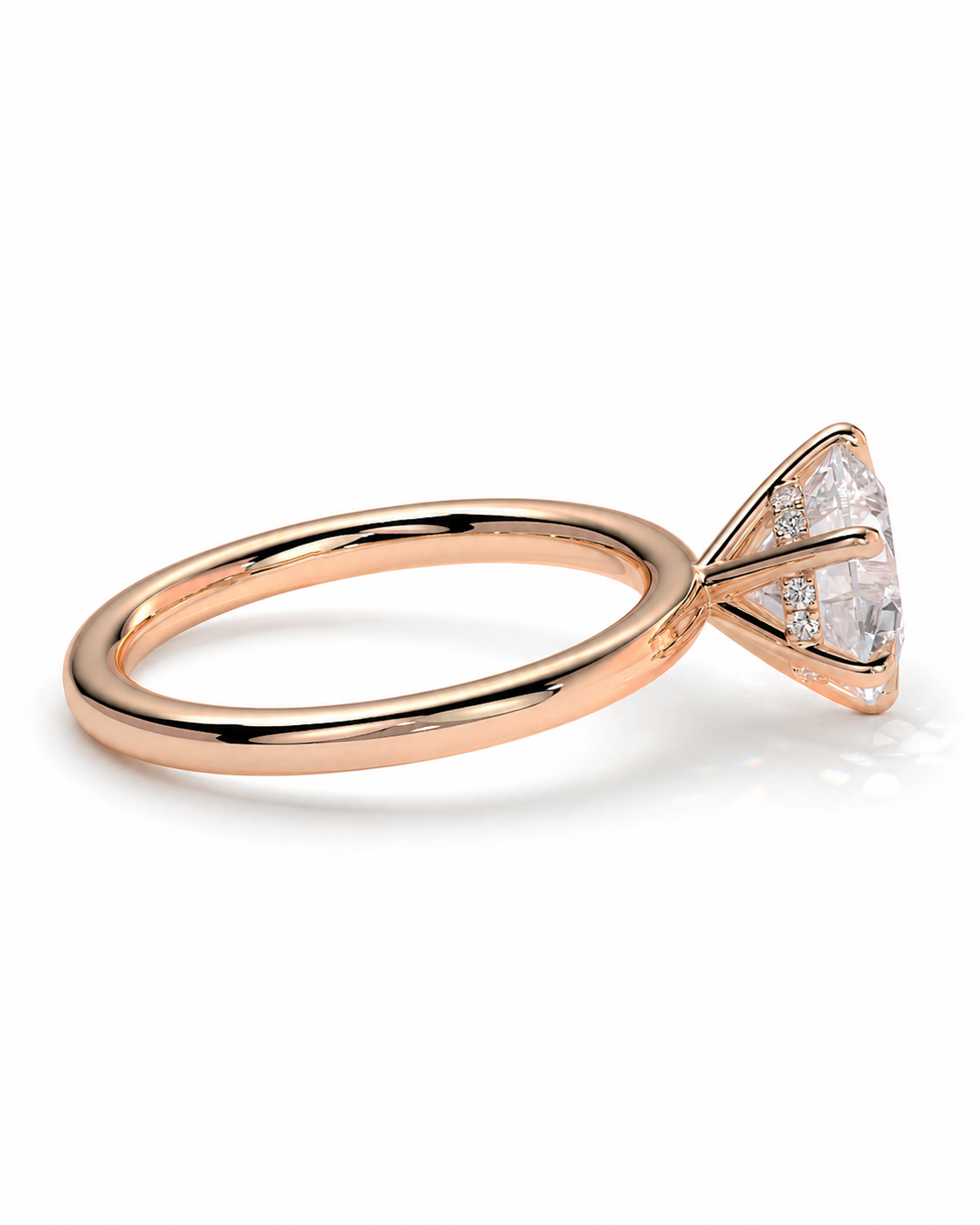 color_10K_RG, color_14K_RG &&A rose gold ring with a triangular bezel setting holding clear gemstones, shown on a clean white background.