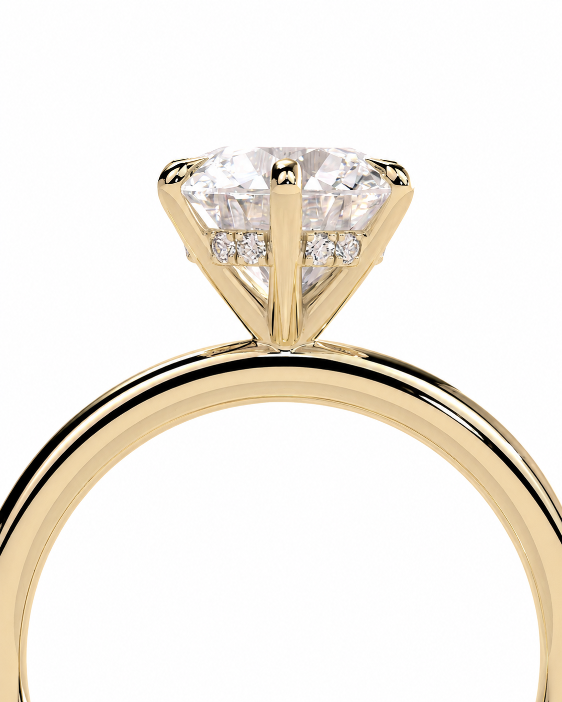 color_10K_YG, color_14K_YG &&A close-up of a yellow gold ring with a large round brilliant-cut center stone and small side stones, shown on a plain white background.