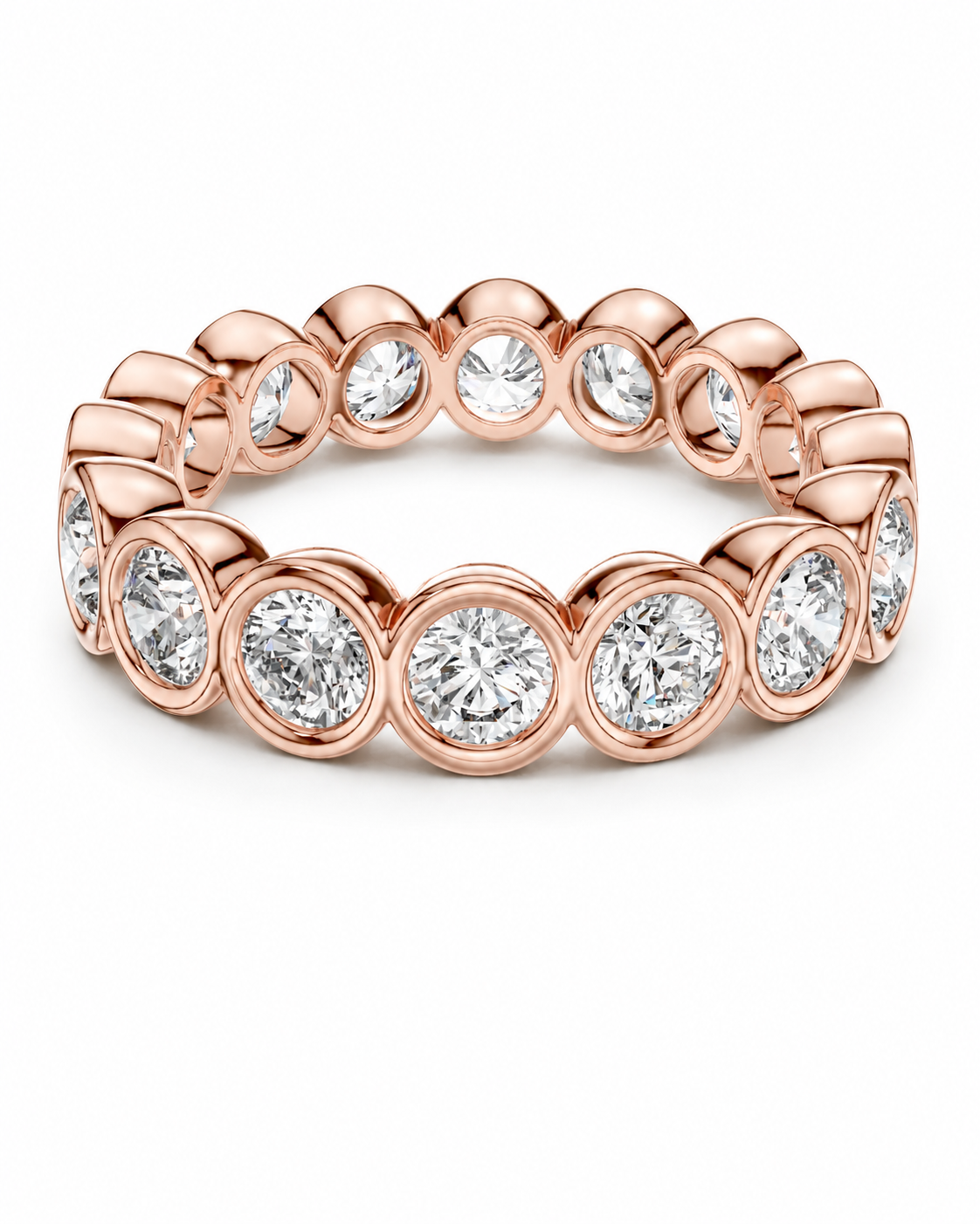 color_10K_RG, color_14K_RG &&	A rose gold eternity band ring featuring a continuous row of round-cut clear gemstones in bezel settings, shown on a clean white background.