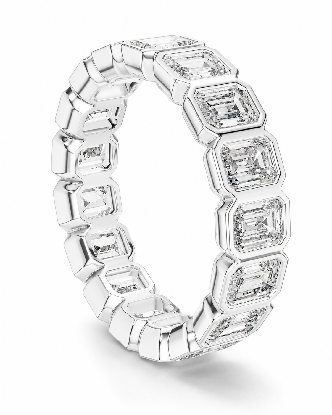 color_925_SIL,color_935_ARG,color_10K_WG, color_14K_WG &&	
A silver-toned eternity ring featuring a continuous row of emerald-cut clear gemstones in a geometric, faceted setting, shown on a clean white background.