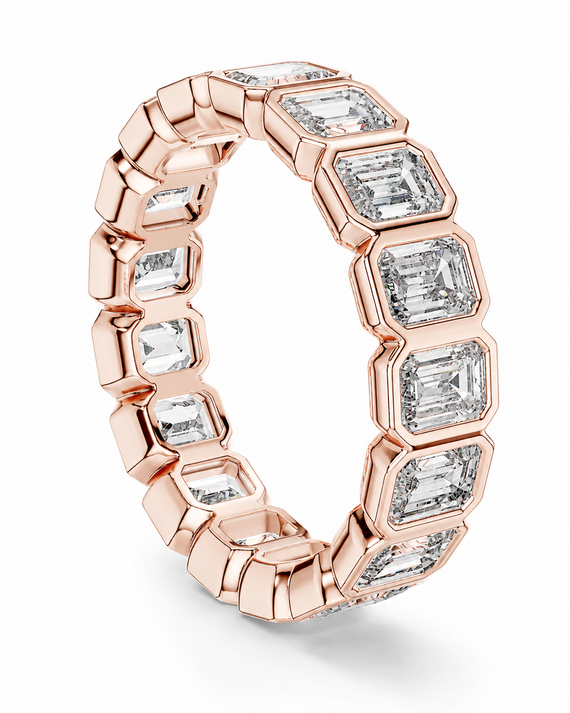 color_10K_RG, color_14K_RG &&	A rose gold eternity ring featuring a continuous row of baguette-cut clear gemstones in a bezel setting, shown on a clean white background.