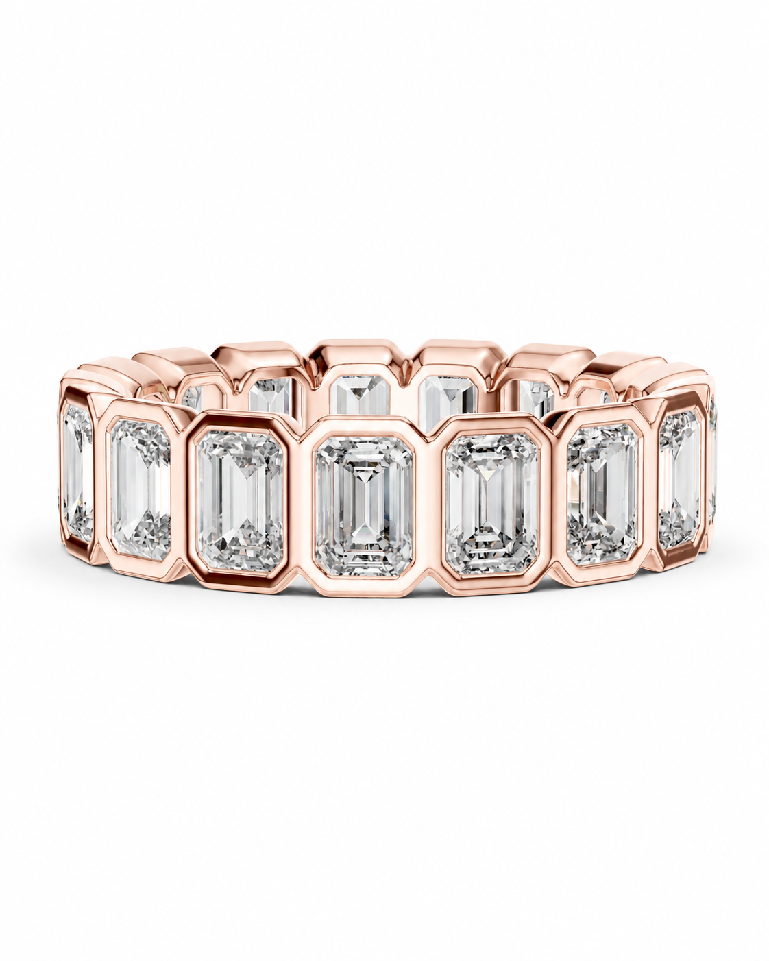 color_10K_RG, color_14K_RG &&	A rose gold eternity ring featuring a row of baguette-cut clear gemstones in a bezel setting, shown against a plain white background.