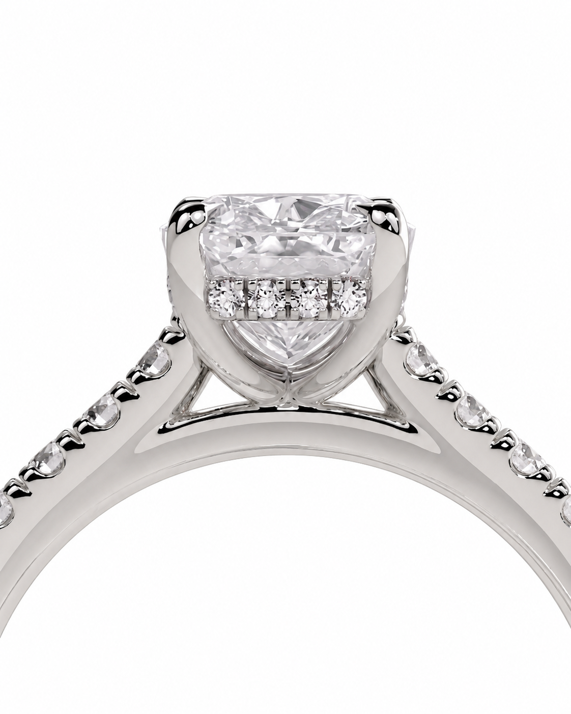 color_925_SIL,color_935_ARG,color_10K_WG, color_14K_WG &&A close-up studio shot of a silver-toned diamond ring featuring a large heart-shaped center stone and a row of smaller diamonds in a halo setting, with a delicate beaded band.