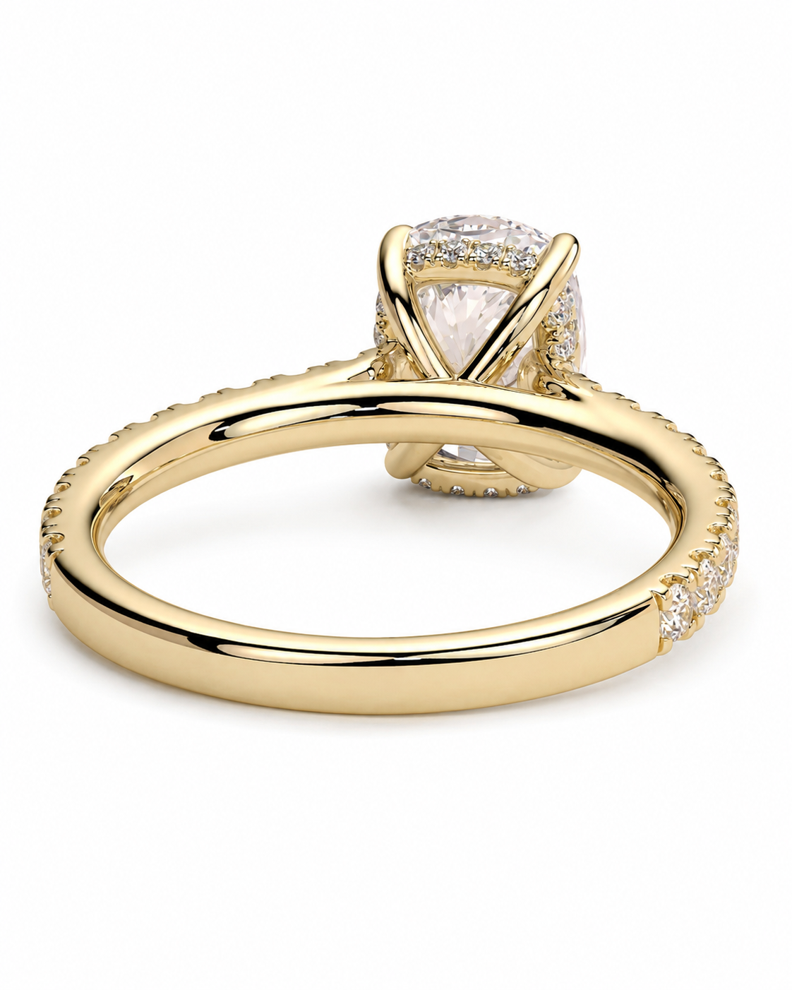 color_10K_YG, color_14K_YG &&A yellow gold engagement ring featuring a large cushion-cut clear center stone in a four-prong setting, with a split shank accented by small pave diamonds on a white background.