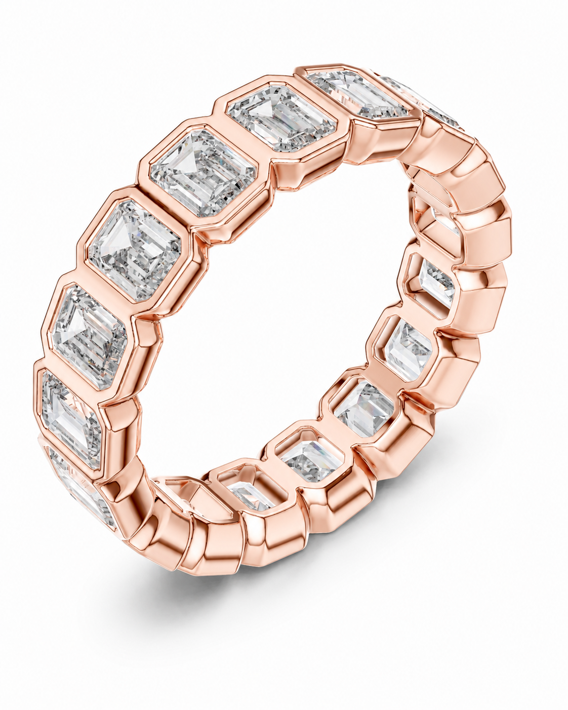 color_10K_RG, color_14K_RG &&	A rose gold eternity ring featuring baguette-cut clear diamonds, set in a polished band with a clean white background.