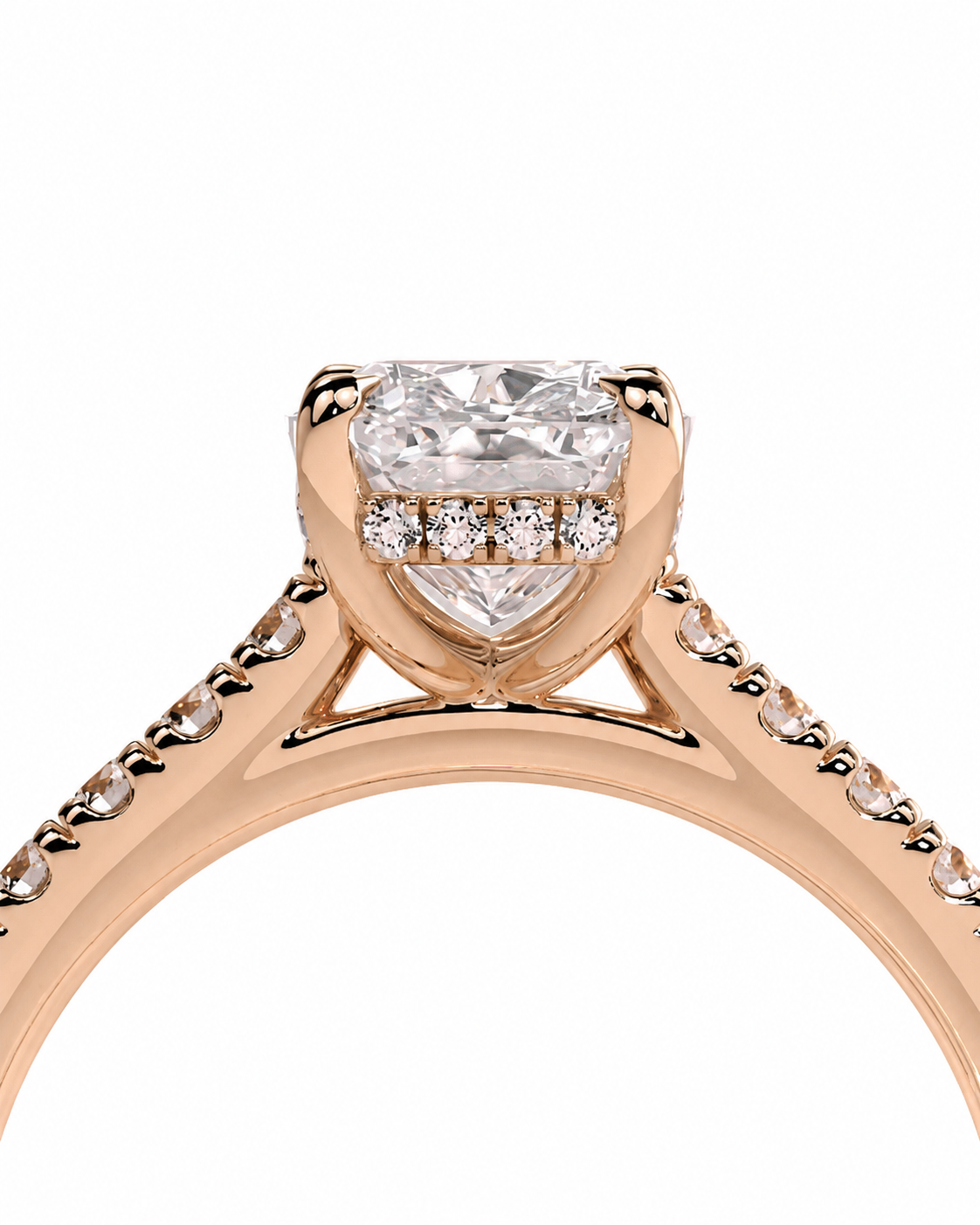 color_10K_RG, color_14K_RG &&A close-up of a rose gold engagement ring featuring a heart-shaped clear gemstone in a prong setting, accented by small round diamonds along the band, on a solid white background.