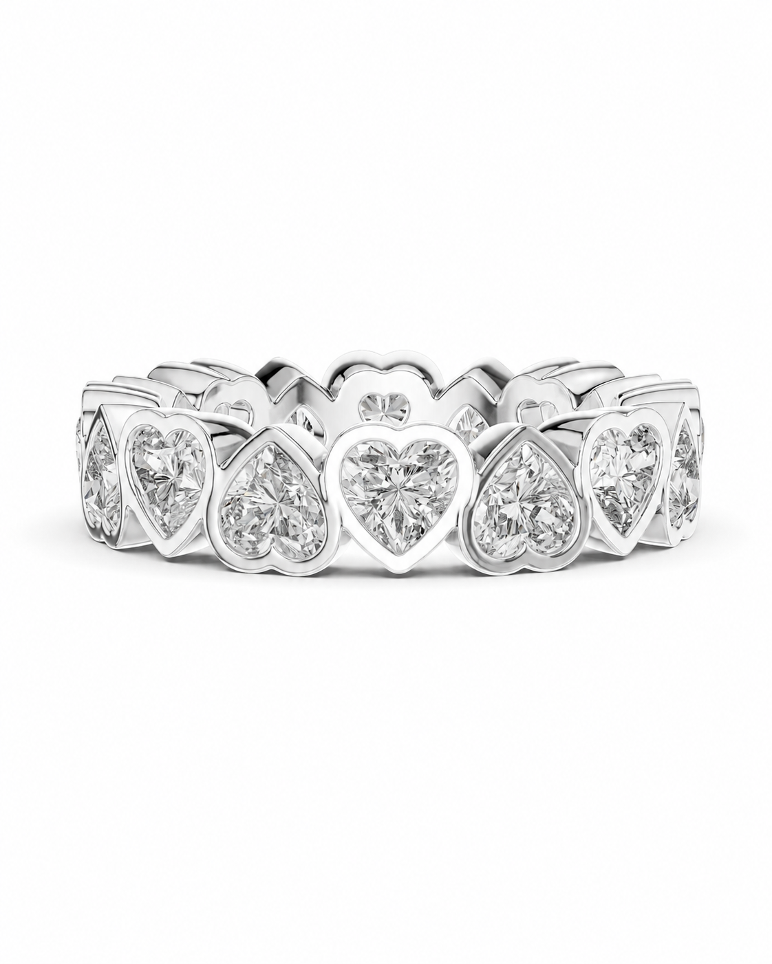 color_925_SIL,color_935_ARG,color_10K_WG, color_14K_WG &&	
A silver heart eternity ring featuring a row of heart-shaped diamonds set in a polished silver band, shown against a plain white background.