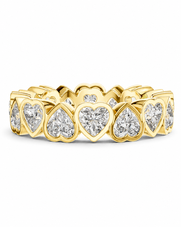 color_10K_YG, color_14K_YG &&	
A yellow gold eternity band ring featuring a continuous row of heart-shaped diamond settings, photographed on a clean white background.