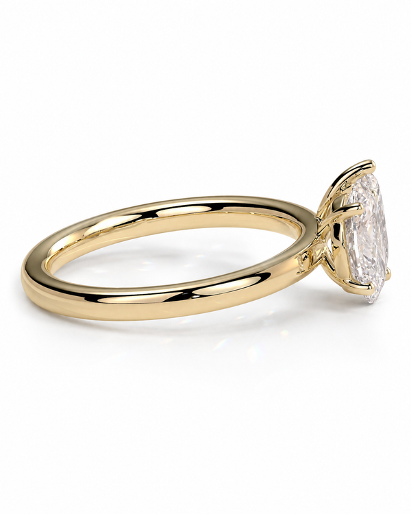 color_10K_YG, color_14K_YG &&A yellow gold engagement ring featuring a large, clear baguette-cut diamond in a prong setting, shown on a clean white background.