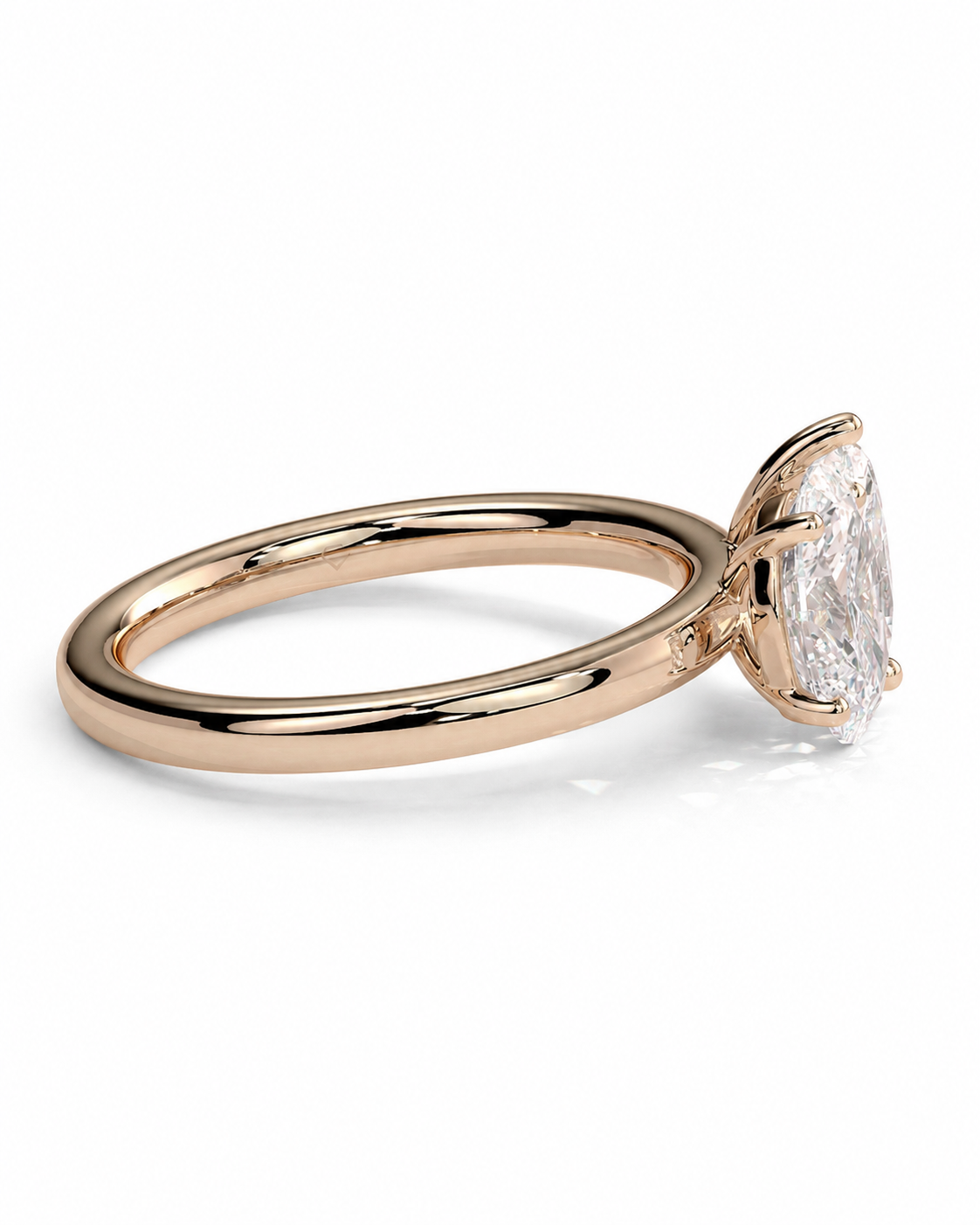 color_10K_RG, color_14K_RG &&A rose gold engagement ring featuring a large oval-cut clear gemstone in a four-prong setting, shown on a clean white background.