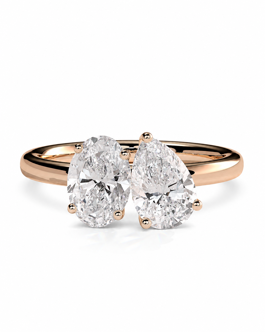 color_10K_RG, color_14K_RG &&A rose gold engagement ring featuring two pear-cut diamonds in a side-by-side setting on a polished band, shown against a clean white background.