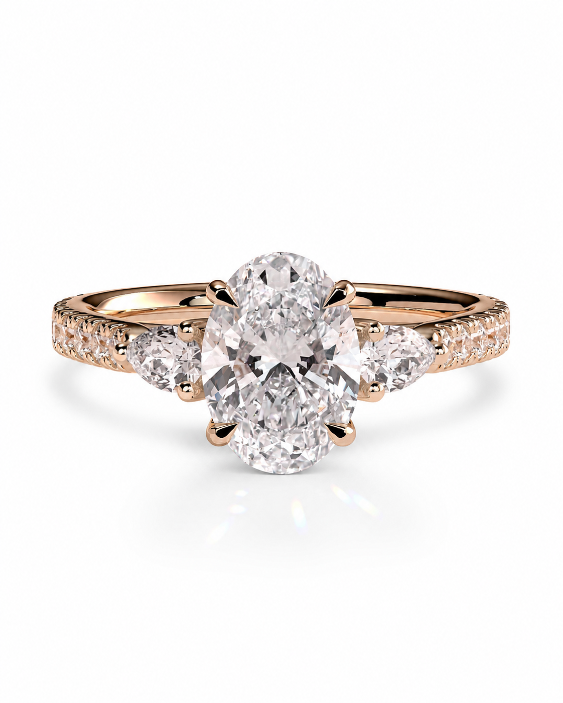 color_10K_RG, color_14K_RG &&A rose gold engagement ring featuring a large oval center diamond with smaller round diamonds set along the shoulders, shown on a clean white background.