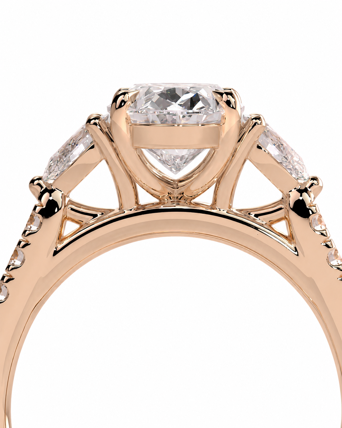 color_10K_RG, color_14K_RG &&Rose gold diamond ring with a large round-cut center stone and smaller side stones, shown in a close-up studio shot on a white background.