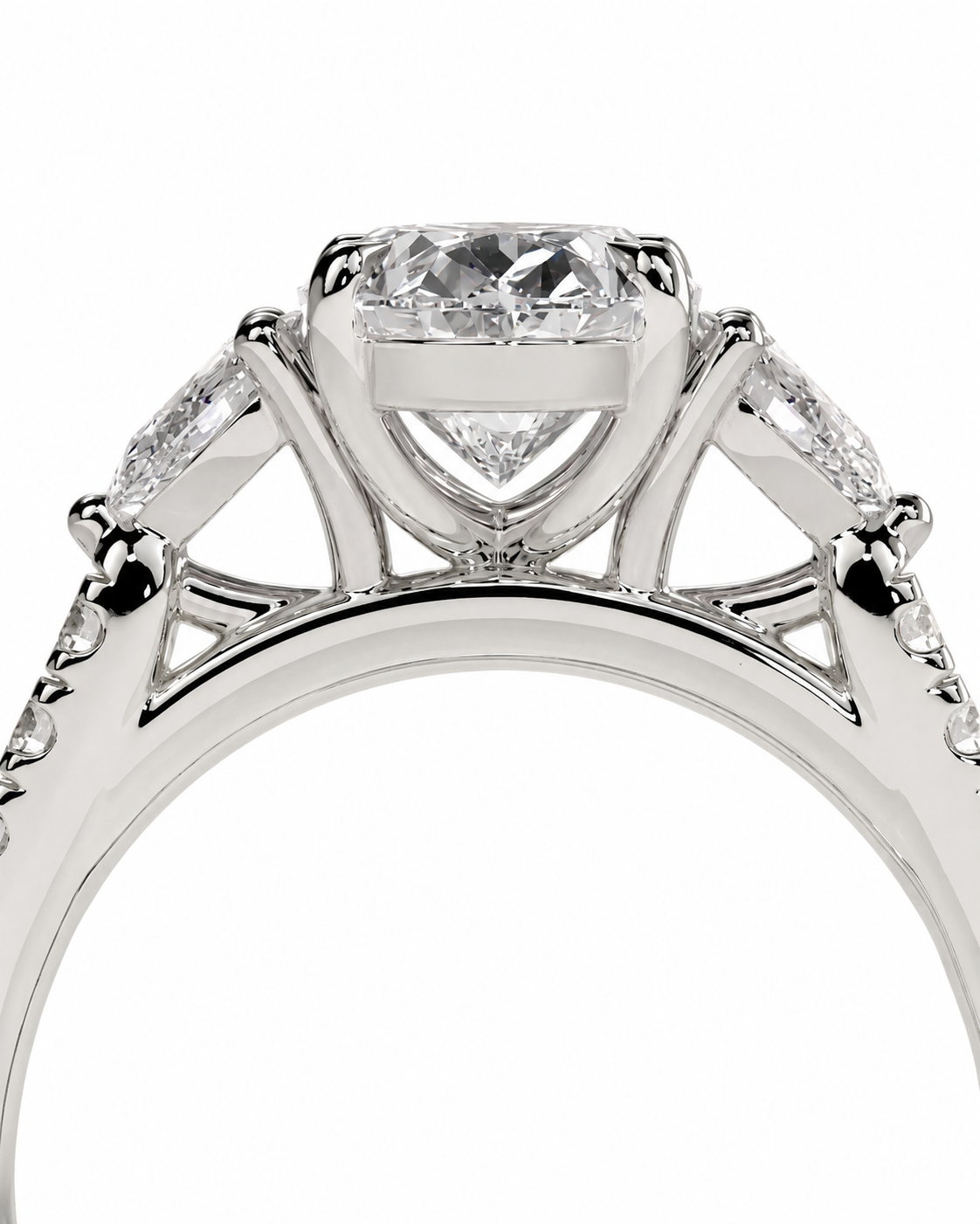color_925_SIL,color_935_ARG,color_10K_WG, color_14K_WG &&A close-up studio shot of a silver-toned diamond ring with a large round brilliant-cut center stone and smaller side stones, shown against a plain white background.