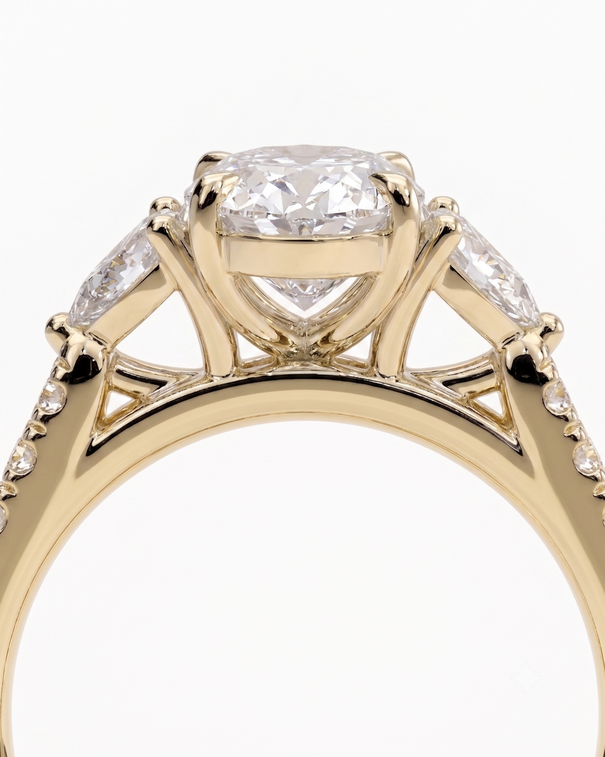color_10K_YG, color_14K_YG &&A close-up of a yellow gold ring with a large oval center stone and smaller marquise-cut side stones, shown against a plain white background.