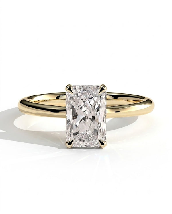 color_10K_YG, color_14K_YG &&A yellow gold engagement ring featuring a large rectangular radiant-cut diamond center stone in a four-prong setting, shown on a clean white background with a soft shadow.