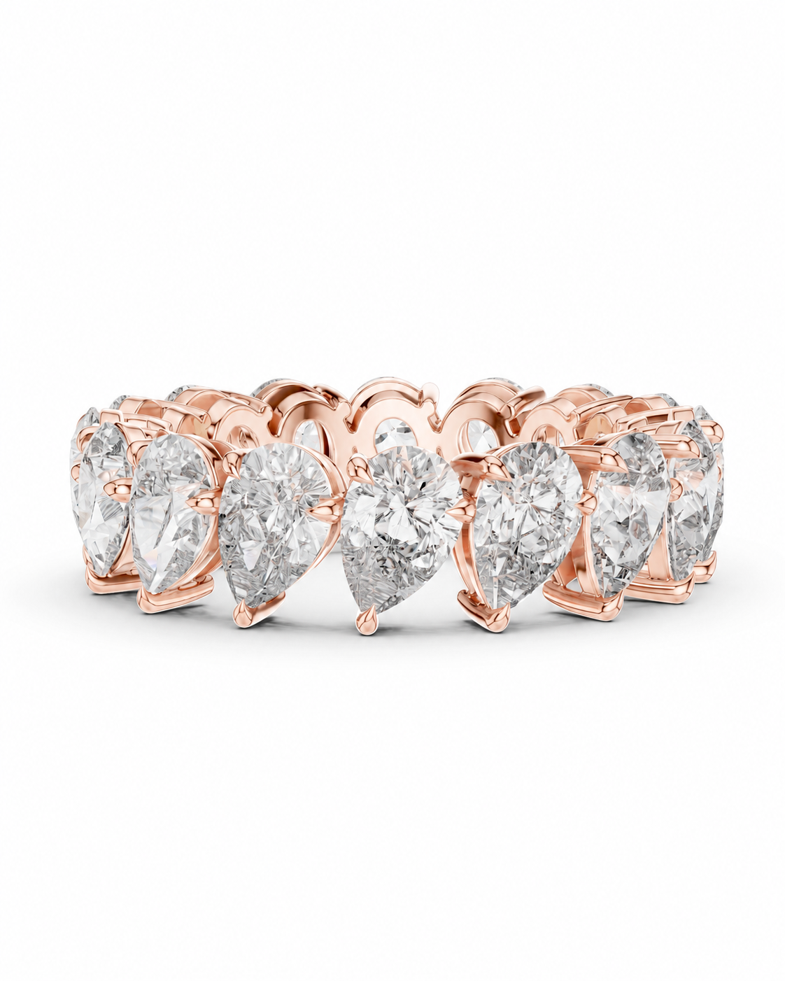 color_10K_RG, color_14K_RG &&	A rose gold eternity ring featuring a row of pear-cut clear gemstones in a prong setting, shown on a clean white background.