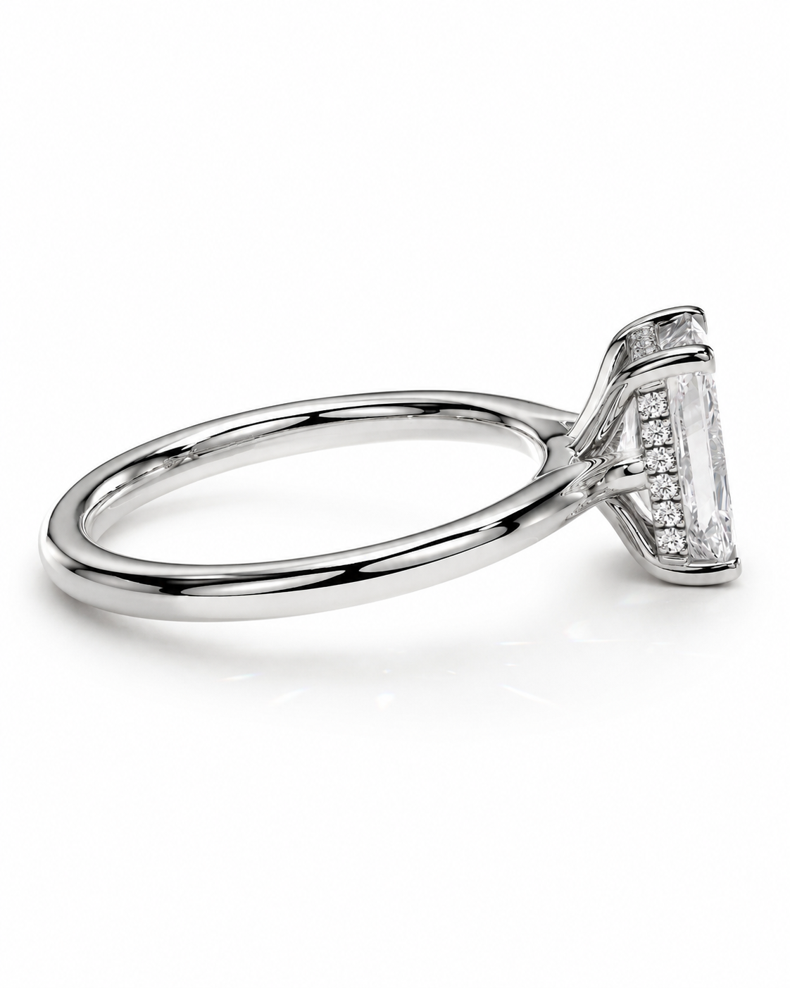 color_925_SIL,color_935_ARG,color_10K_WG, color_14K_WG &&A silver-toned diamond ring featuring a marquise-cut center stone and smaller side stones, shown in a three-quarter view on a clean white background.