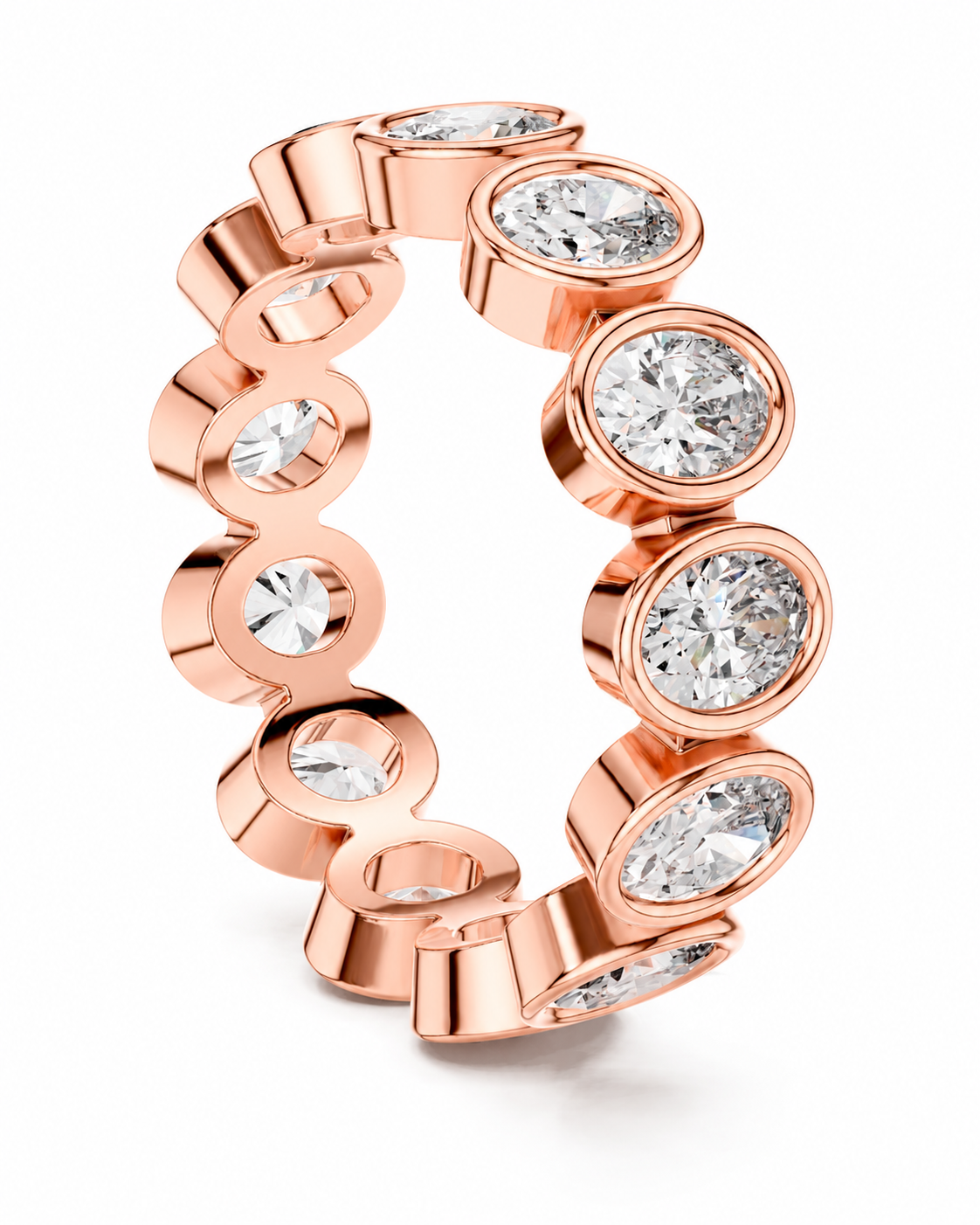 color_10K_RG, color_14K_RG &&	A rose gold eternity ring featuring multiple bezel-set round diamonds, displayed on a clean white background.