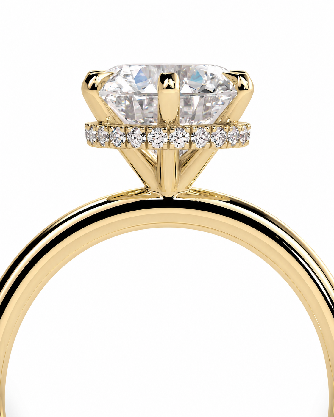 color_10K_YG, color_14K_YG &&A close-up of a yellow gold solitaire engagement ring featuring a large round brilliant-cut center stone and a halo of small round stones, set against a plain white background.