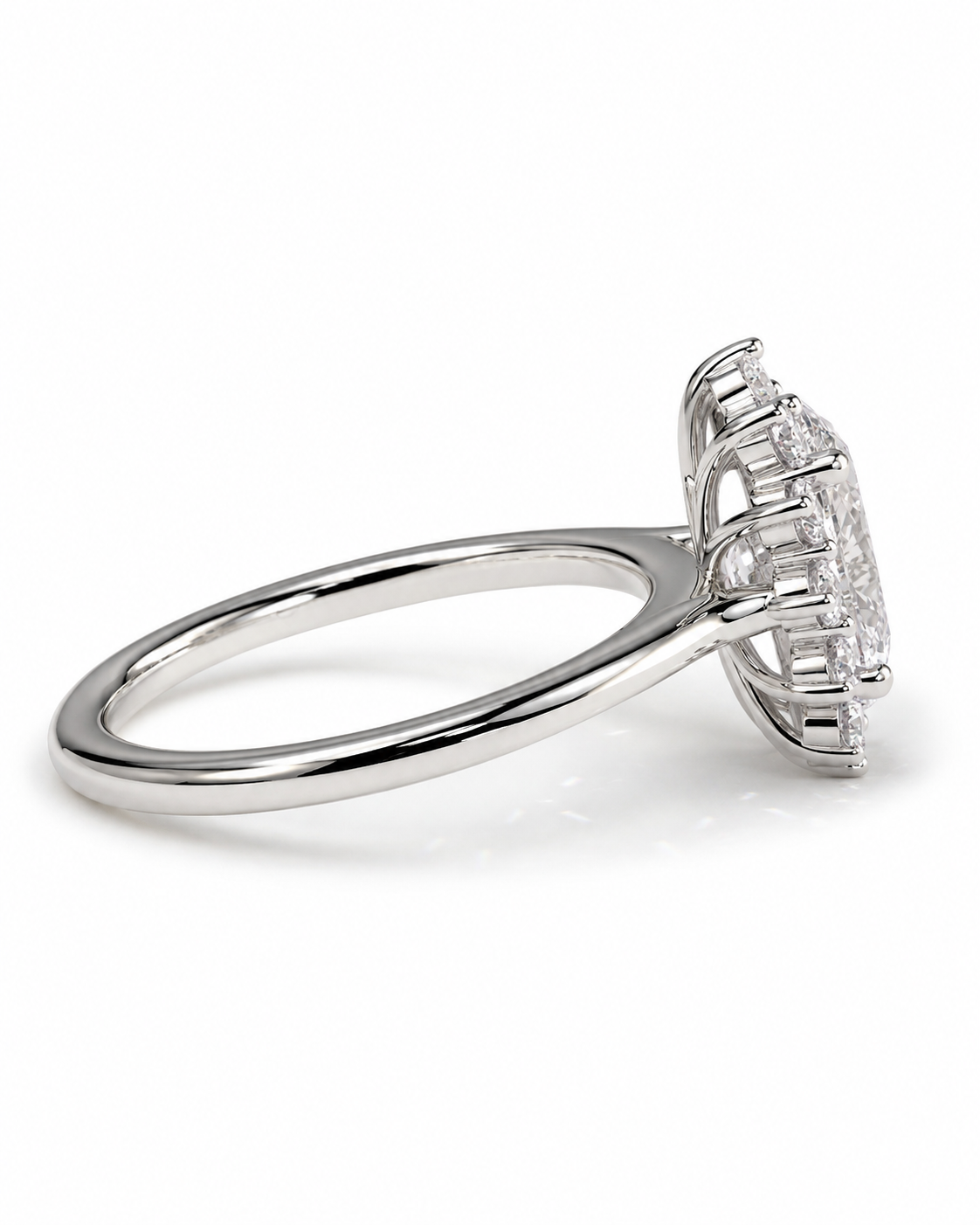 color_925_SIL,color_935_ARG,color_10K_WG, color_14K_WG &&A silver-toned diamond ring with a round brilliant-cut center stone and smaller surrounding diamonds, shown in a three-quarter view on a white background.