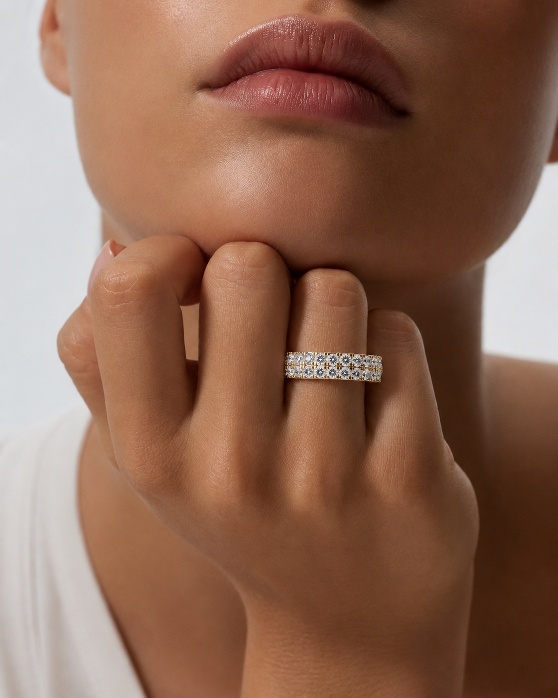 color_10K_YG, color_14K_YG &&	
Front view of a double-row round moissanite shared prong full eternity wedding band for women.